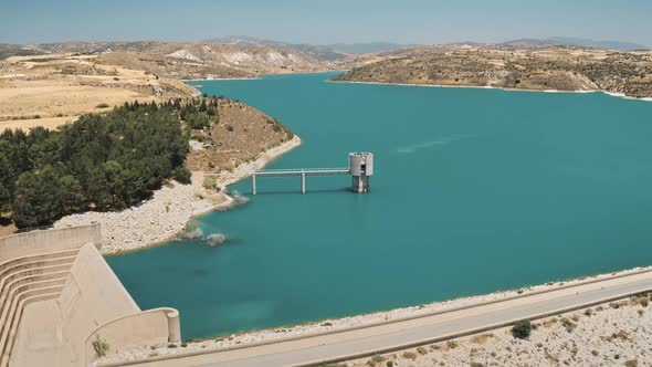 Aerial View of Asprokremmos Dam Reservoir on Blue Lake Waters in Desert Cyprus Area