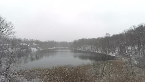 Flying Over Mahopac Lake During a Snow Fall