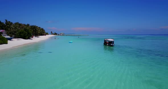 Wide angle flying abstract view of a white paradise beach and aqua turquoise water background in hi 