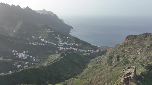 Aerial Drone View of a Wild Touristic Twisty Road in the Green Lush Mountains Along the Atlantic