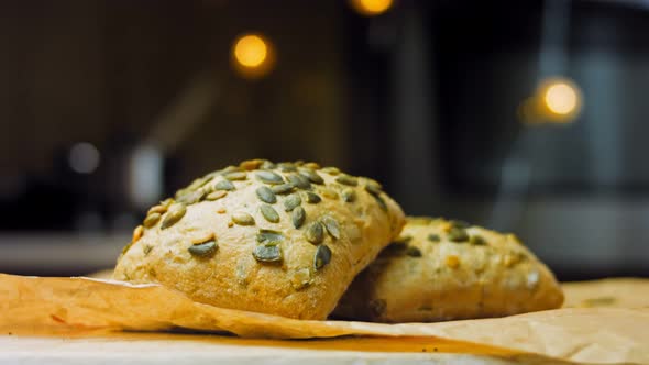 Two Freshly Baked Square Loaves of Bread with Pumpkin Seeds