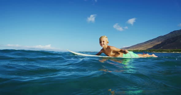 Young Boy Surfing