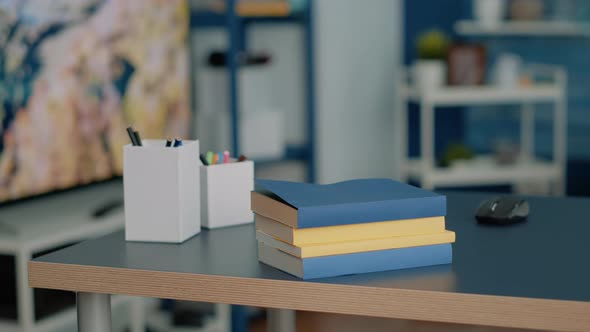 Nobody at Home Desk with School Supplies and Books