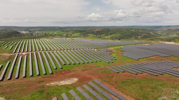 Aerial shot of a medium-sized solar farm in the southern Portuguese countryside, concept for sustain