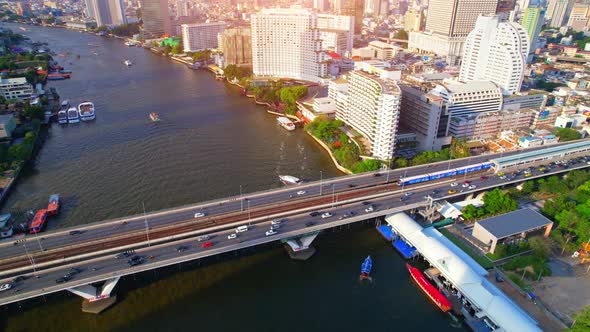 4K UHD : Aerial view over the Chao Phraya River and Buildings of Bangkok