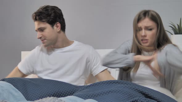Problem in Relationship, Unhappy Young Couple Arguing in Bed
