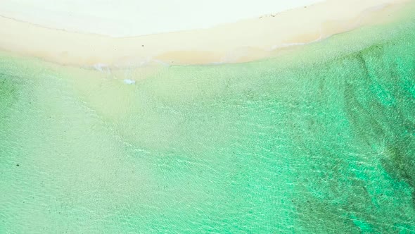 Soft Beautiful Ocean Wave on Sandy Beach