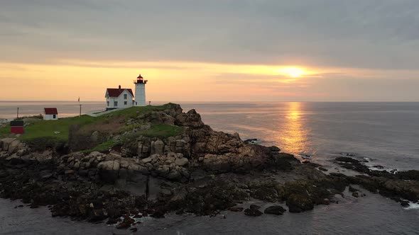 Nubble Lighthouse in Maine at Sunrise Drone Video