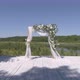 Drone view of wedding arch on the pier by the river next to the forest 33 - VideoHive Item for Sale