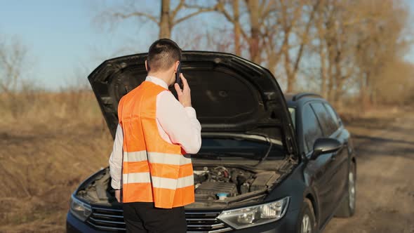 Stranded Man With Broken Down Car Calls for Help