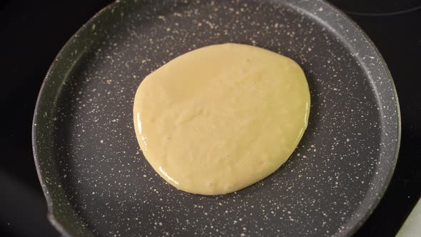 Top Shot Pancake Cooking Process in a Frying Pan