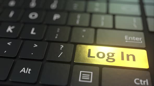 Black Computer Keyboard and Gold Log in Key