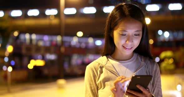 Woman use of smart phone at outdoor