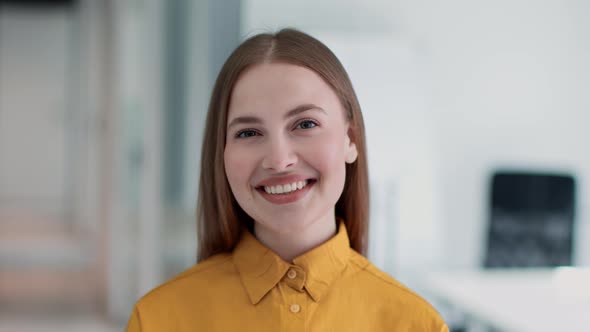 Young Attractive Woman Office Manager Smiling Widely to Camera Expressing Positivity and