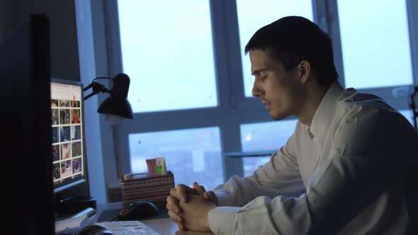 Tired Businessman Working Late Night Napping in Office Overtime