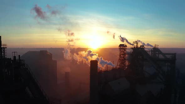 Aerial Forward Cityscape Sunset Factory Chimney Smoke Building Steam Thermal Power Plant