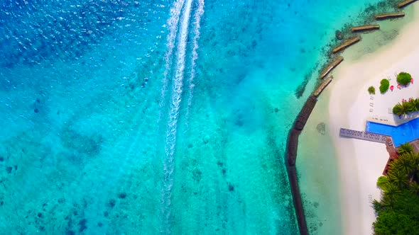 Empty nature of shore beach by blue ocean and sand background near sandbank