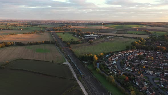 Aerial view of railway in the countryside and trains passing