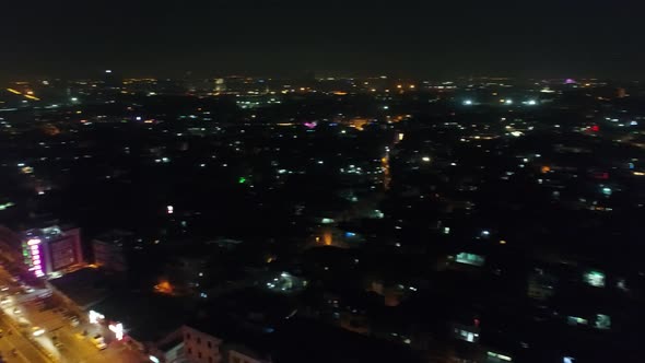 New Delhi city by night in India seen from the sky