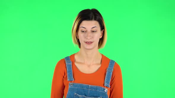 Woman Is Upset and Tired, Sighs. Green Screen