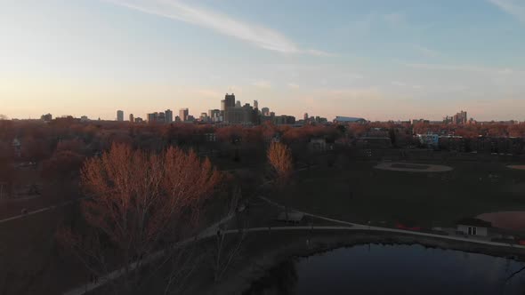 Aerial footage Minneapolis skyline during golden hour view from far away