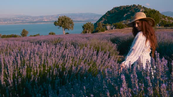 Girl on the Lavender Field at Sunset