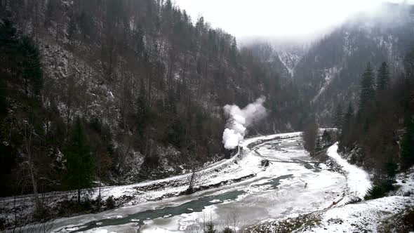 Train rolling on a valley