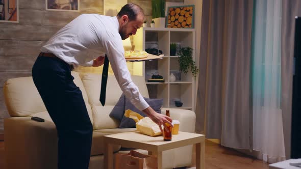 Businessman with Tie Arriving at Home with Pizza