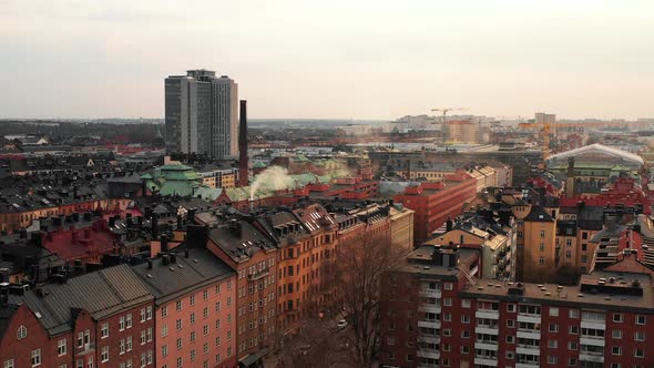 Aerial View of Streets and Multistorey Urban Houses in Neighbourhood From Drone