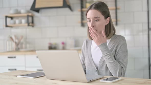 Shocked Young Woman Getting Upset on Laptop