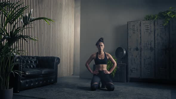 Fitness Woman Breathing and Resting During a Workout Pause at Home or Gym. Active Tired Woman Taking