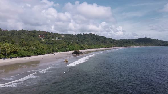 aerial footage of playa playitas on the western shores of costa rica and the view of the pacific oce