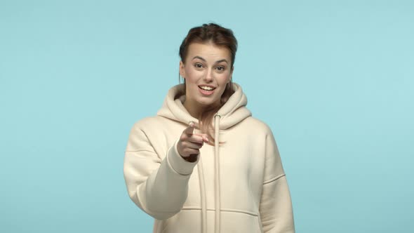 Slow Motion of Pretty Blonde Girl in White Hoodie Praising you Trying Encourage Friend Pointing