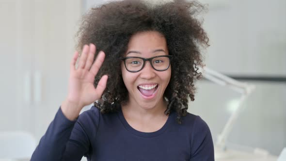 Portrait of African Woman Waving Welcoming