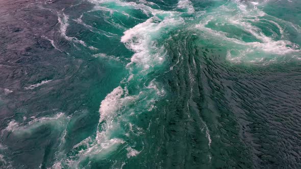 Waves of Water of the River and the Sea Meet Each Other