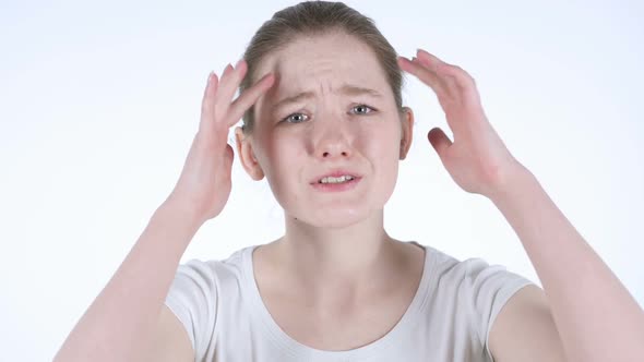 Gesture of Failure By Upset Redhead Woman White Background