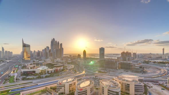 Sunset Over Dubai Media City with Modern Buildings Aerial Timelapse United Arab Emirates