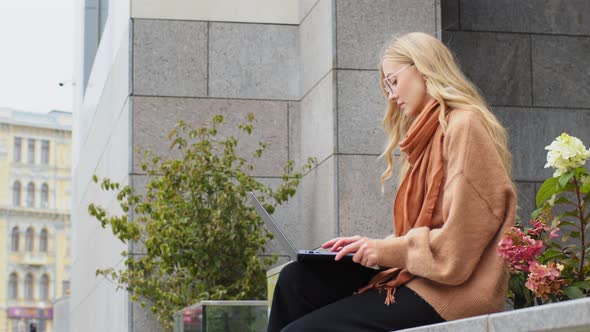 Successful Business Woman Sitting on Street Near Building Caucasian Young Girl Student Learning