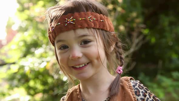 Girl dressed up as Native America with headdress