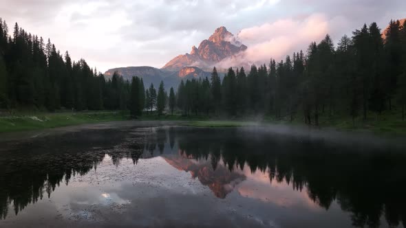 Mountain lake in the Dolomites with Tre Cime di Lavaredo reflection