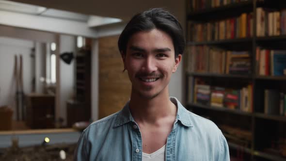 Mixed race man looking at camera and smiling