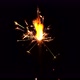 Burning sparkler close up on black background. Burning New Year sparklers - VideoHive Item for Sale