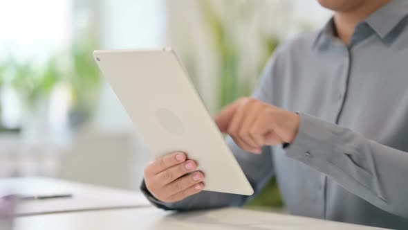 Close Up of African Woman Using Digital Tablet