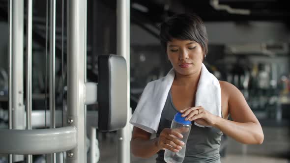 Woman after Training in Gym