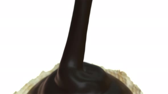 Pouring Melted Chocolate Down Into On Candy