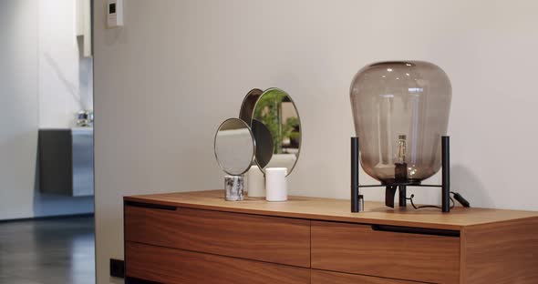 Cozy Interior with Modern Wood Storage Furniture Mirror and Minimalist Lamp