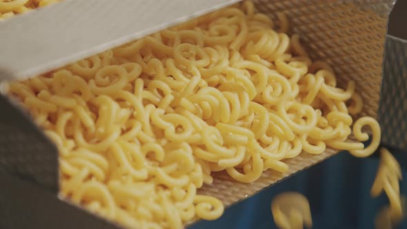 Loads of Pasta being transported on a Pasta Factory Machine