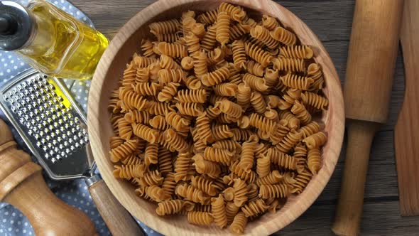 Close Up Image of Buckwheat Fusilli Pasta. Slow Rotation Close Up