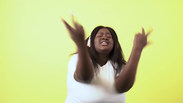 Plus size woman on colored background