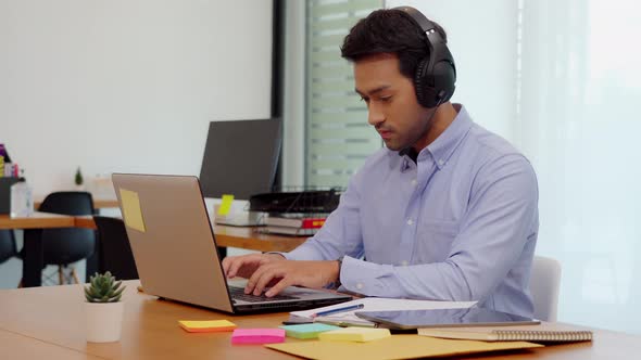 Young business indian man meeting with business team via video conference call